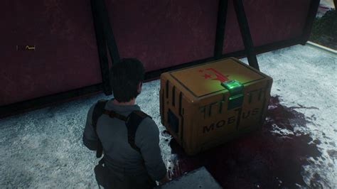 evil within 2 open boxes with metal edges|evil within 2 red containers.